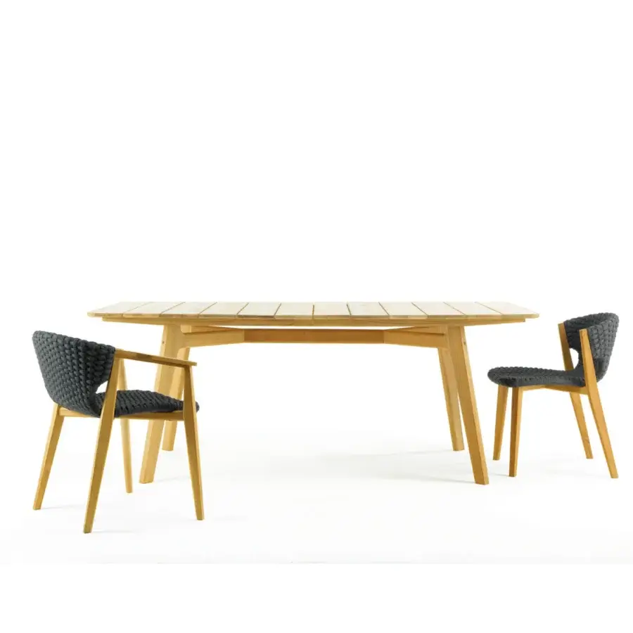 Distinguished Ethimo Knit table crafted in FSC-certified teak with a natural satin finish and subtly rounded rectangular form