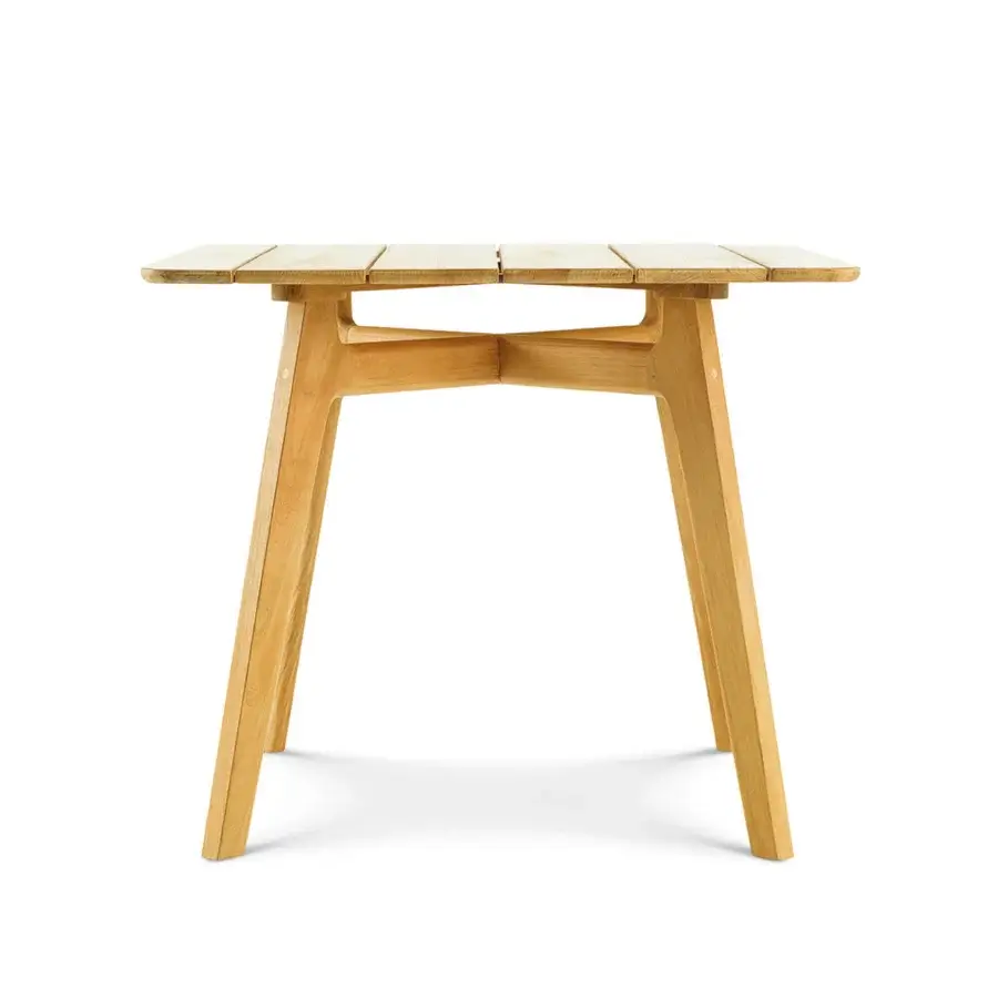 Captivating Ethimo Knit table crafted in light brown FSC-certified teak with a smooth satin sheen