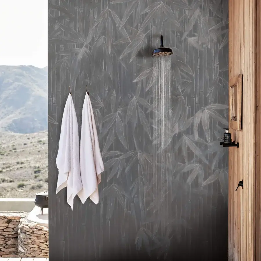 Distinguished Wall&Decò Standing On wallpaper showcases subtle gray tones and a stylized bamboo leaf pattern with a matte finish