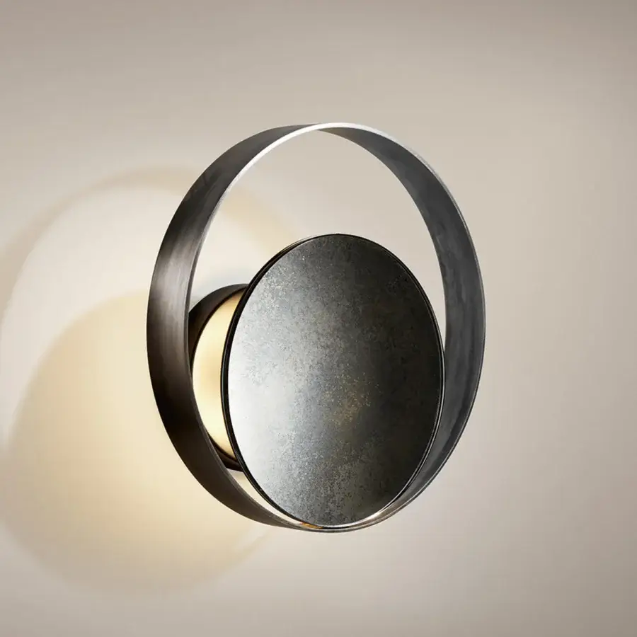 Elegant VENICEM Circle Wall Lamp crafted in burnished brass and matte black nickel delivers captivating indirect 2700K ambient lighting