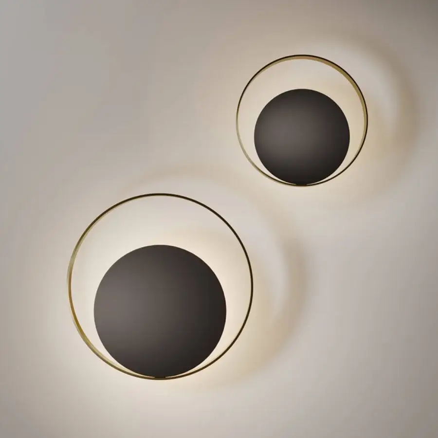Distinguished VENICEM Circle Wall Lamp crafted in burnished brass and matte black nickel with indirect illumination