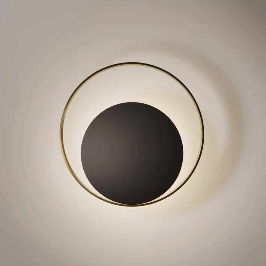 Elegant VENICEM Circle Wall Lamp crafted in burnished brass and matte black nickel with indirect illumination