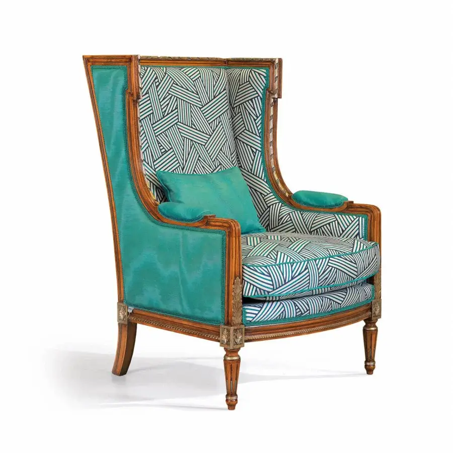 Superior Zanaboni Dorotea lounge chair crafted with golden-brown wood and teal, patterned blue and white fabric upholstery