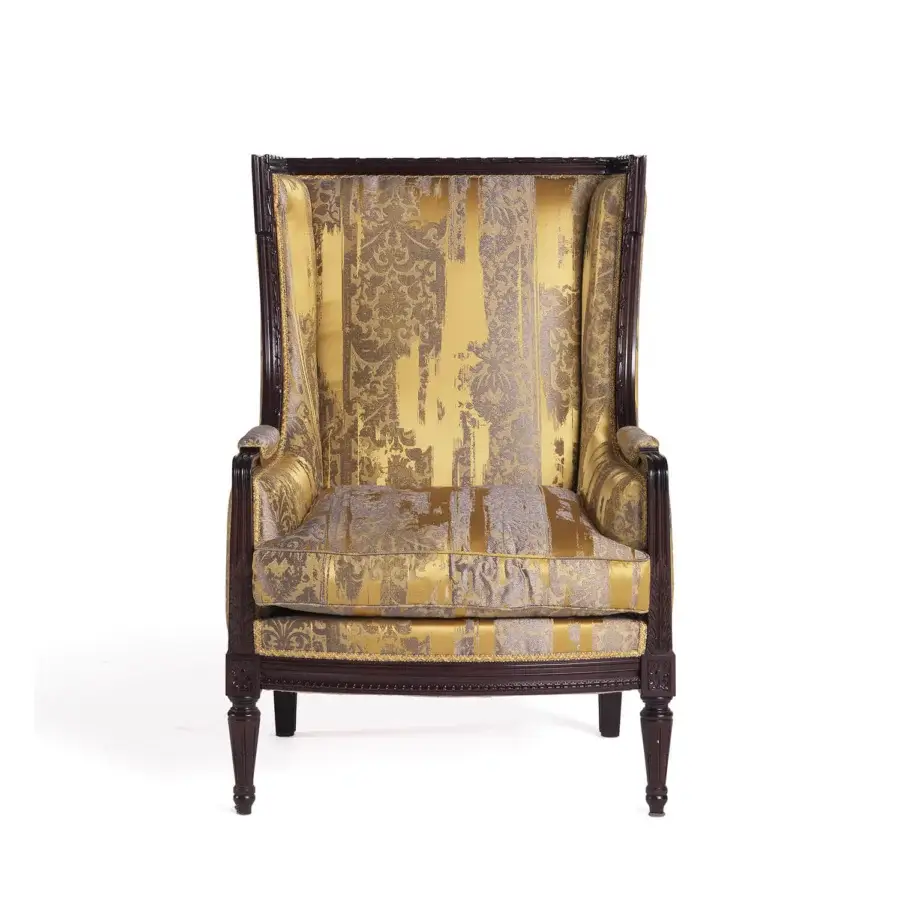 Exceptional Zanaboni Dorotea lounge chair crafted with wood and luxurious fabric upholstery in gold floral and dark polished finish