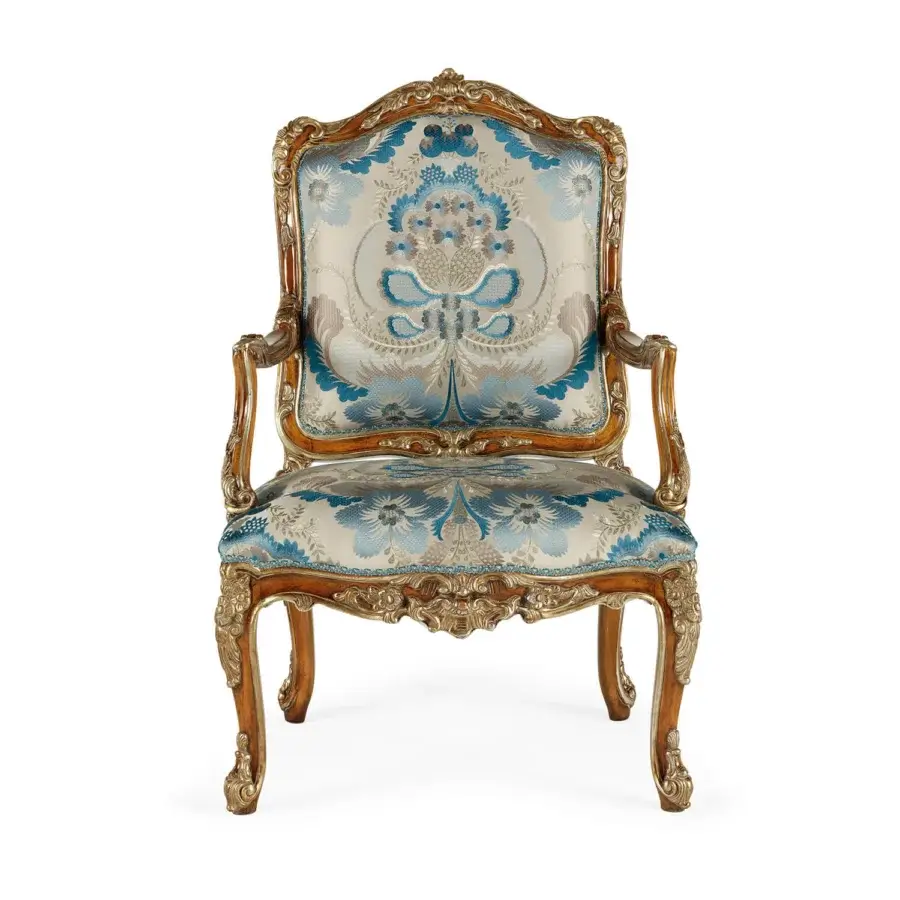 Exquisite Zanaboni Gaia lounge chair with cream and blue floral damask upholstery and warm brown wood finish