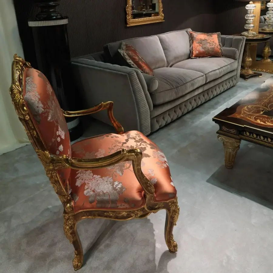 Lavish Zanaboni Gaia lounge chair crafted with golden solid wood and floral damask upholstery in orange and reddish-brown hues