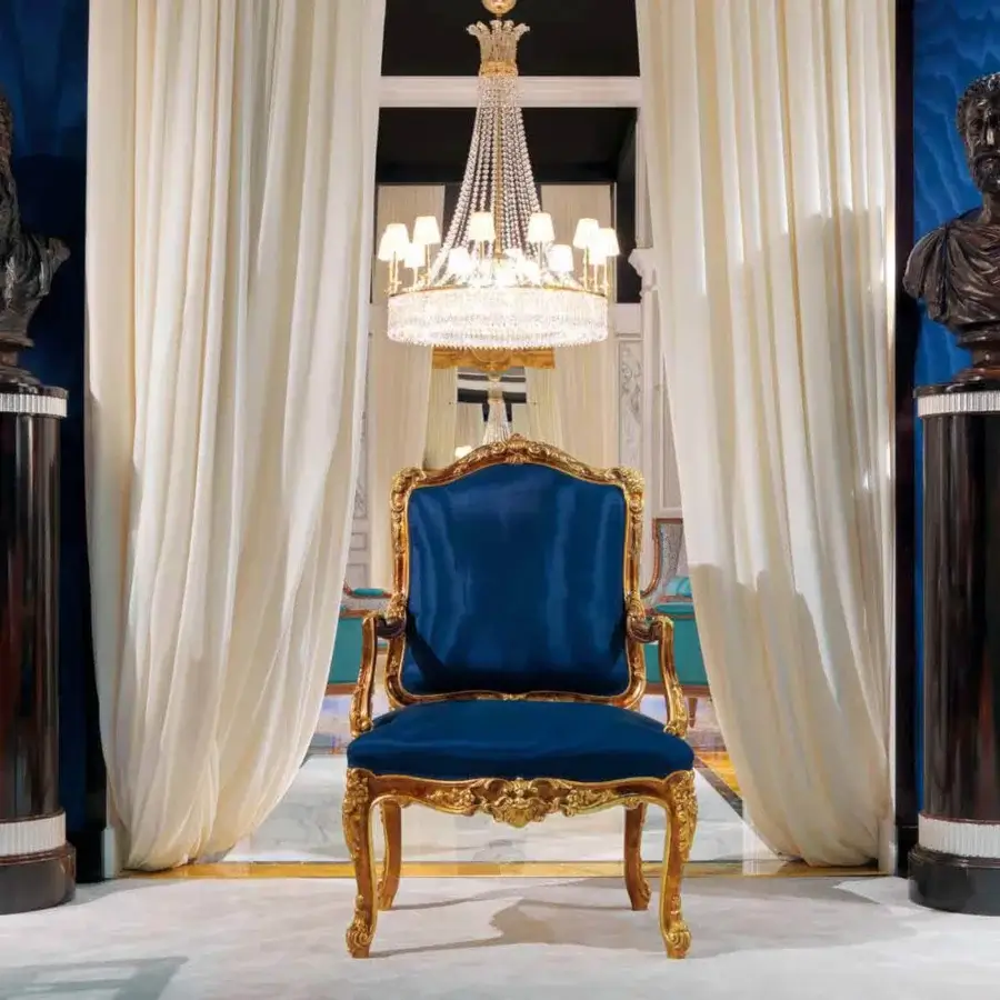 Distinguished Zanaboni Gaia lounge chair with deep blue damask upholstery and gilded solid wood carvings