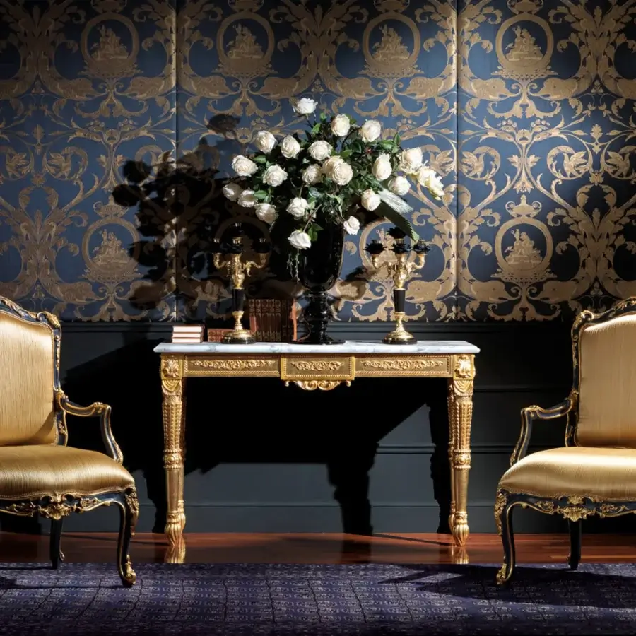 Lavish Zanaboni Gaia lounge chair with golden damask fabric and a glossy, gilded solid wood structure