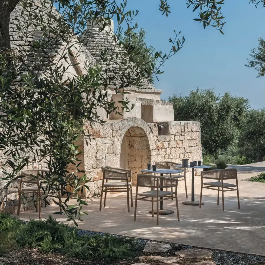 Distinguished Ethimo Enjoy Bistrot table with woven matte grey tabletop and natural finish teak base crafted in Italy