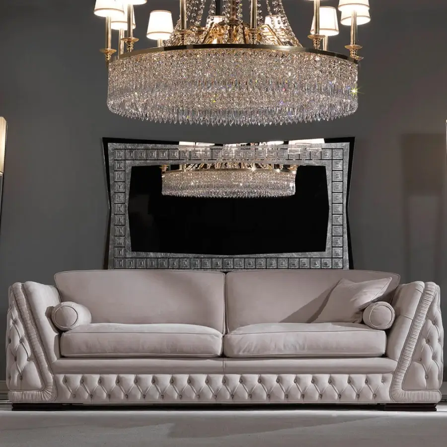 Distinguished Zanaboni Giada sofa with plush light beige textile, elegant capitonné and delicate cream piping
