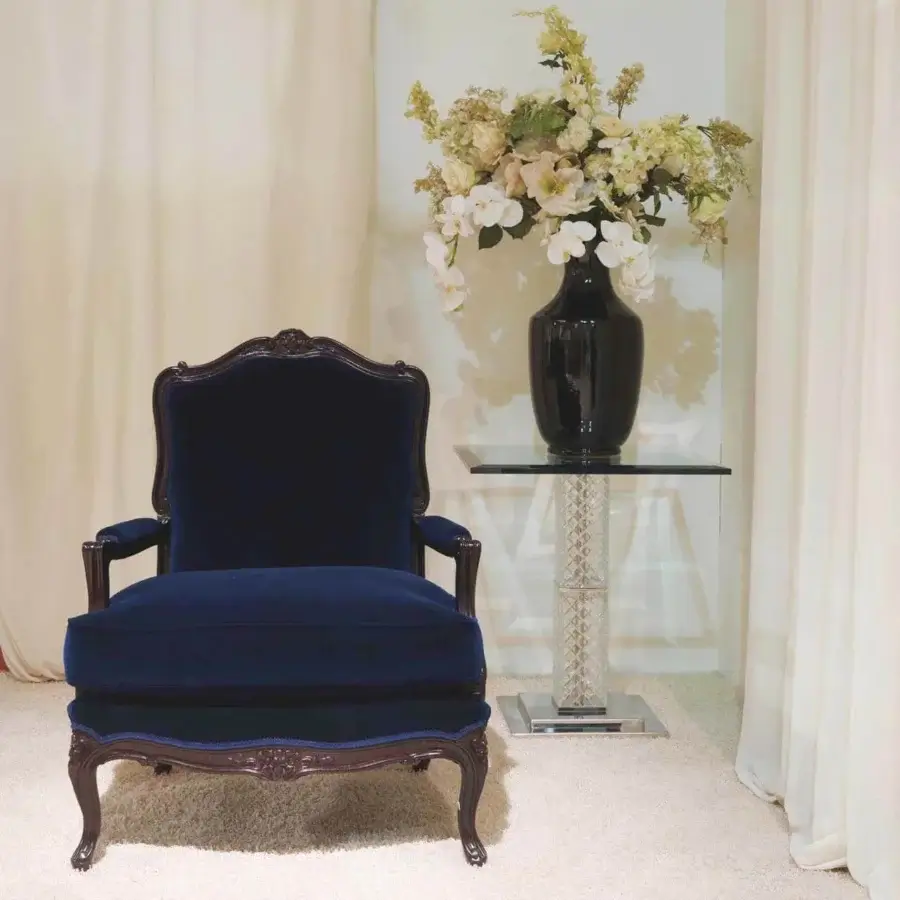 Elegant Zanaboni Luigi XV lounge chair with deep blue velvet-like textile and dark glossy carved solid wood frame