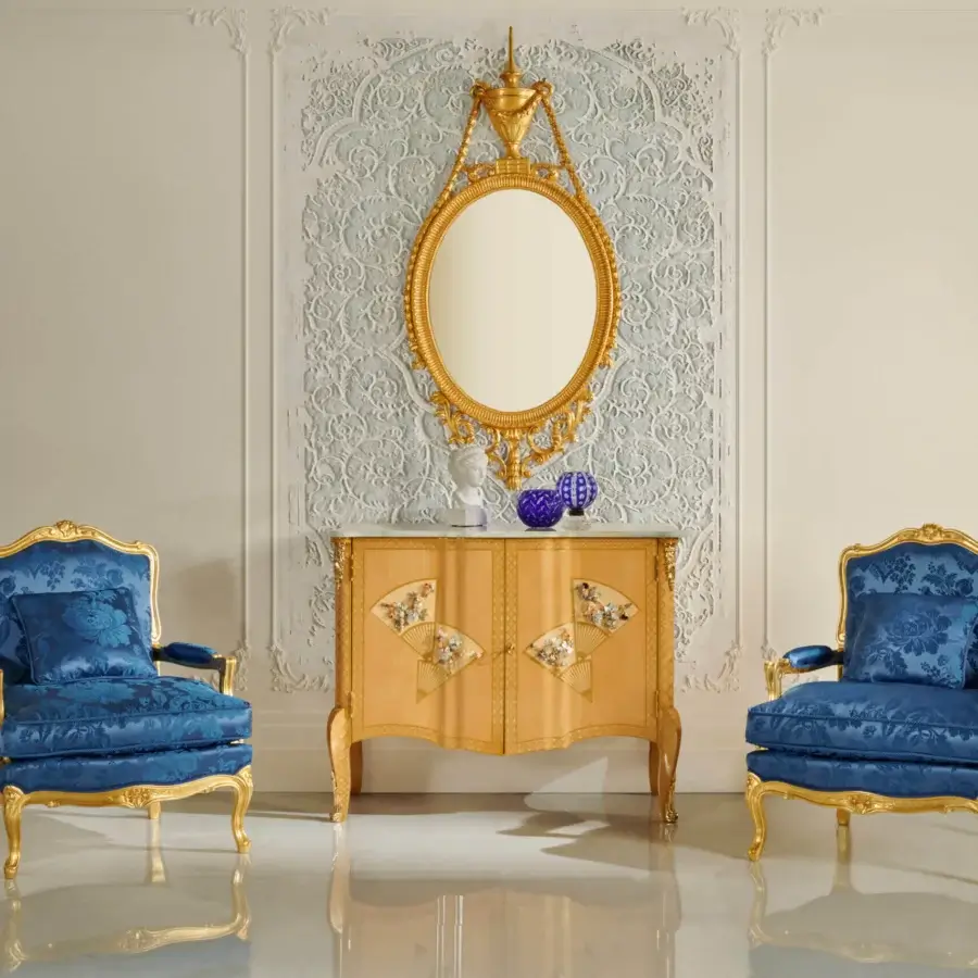 Superior Zanaboni Luigi XV lounge chair with deep blue floral textile upholstery and hand-applied gilded detailing
