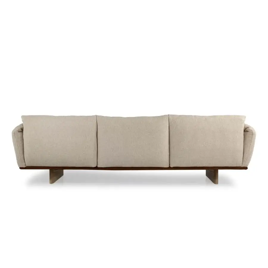 Exceptional Borzalino Connor sofa with neutral beige textile upholstery and exposed leather-covered solid wood base