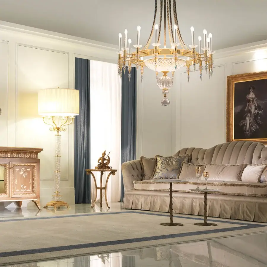 Distinguished Zanaboni Madison sofa with taupe textile, curved silhouette, capitonné upholstery and decorative blue, teal, gold cushions