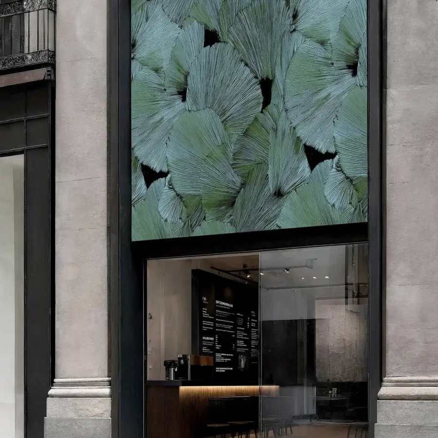 Captivating Wall&Decò Eternal Beauty Outdoor wallpaper with intricate overlapping leaf pattern crafted in grayish-green fiberglass fabric with protective finish