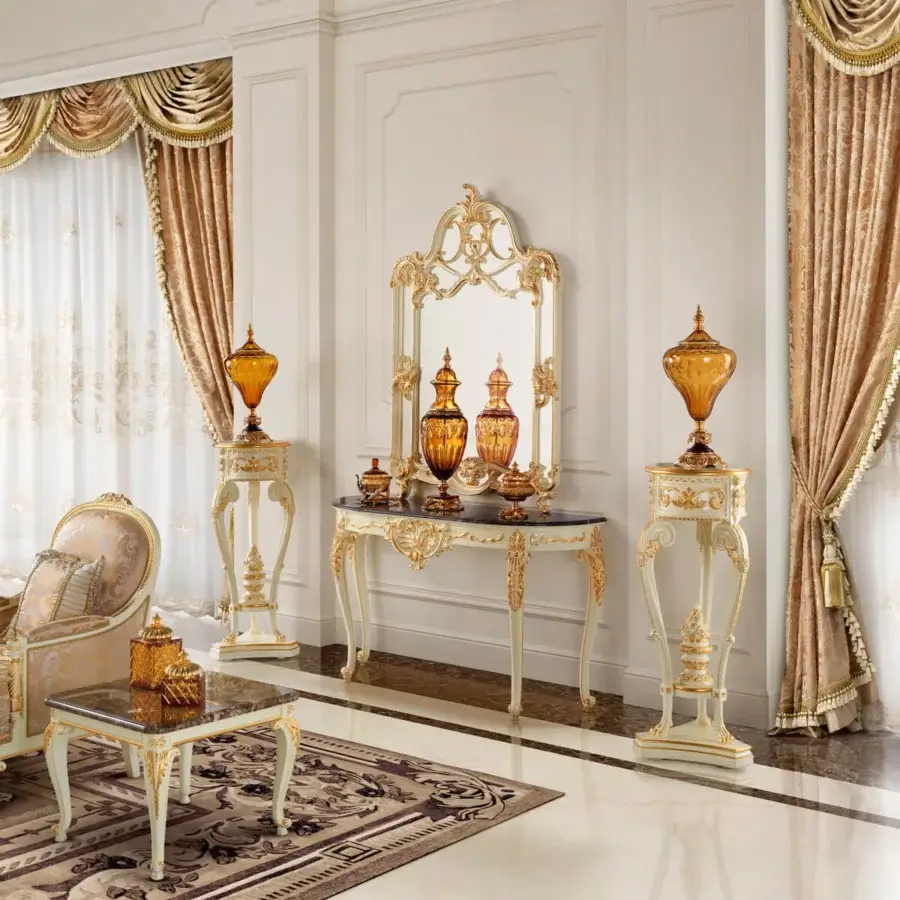 Exceptional Modenese Midnight Moon console crafted in Italy with white finish and gold leaf detailing plus marble top