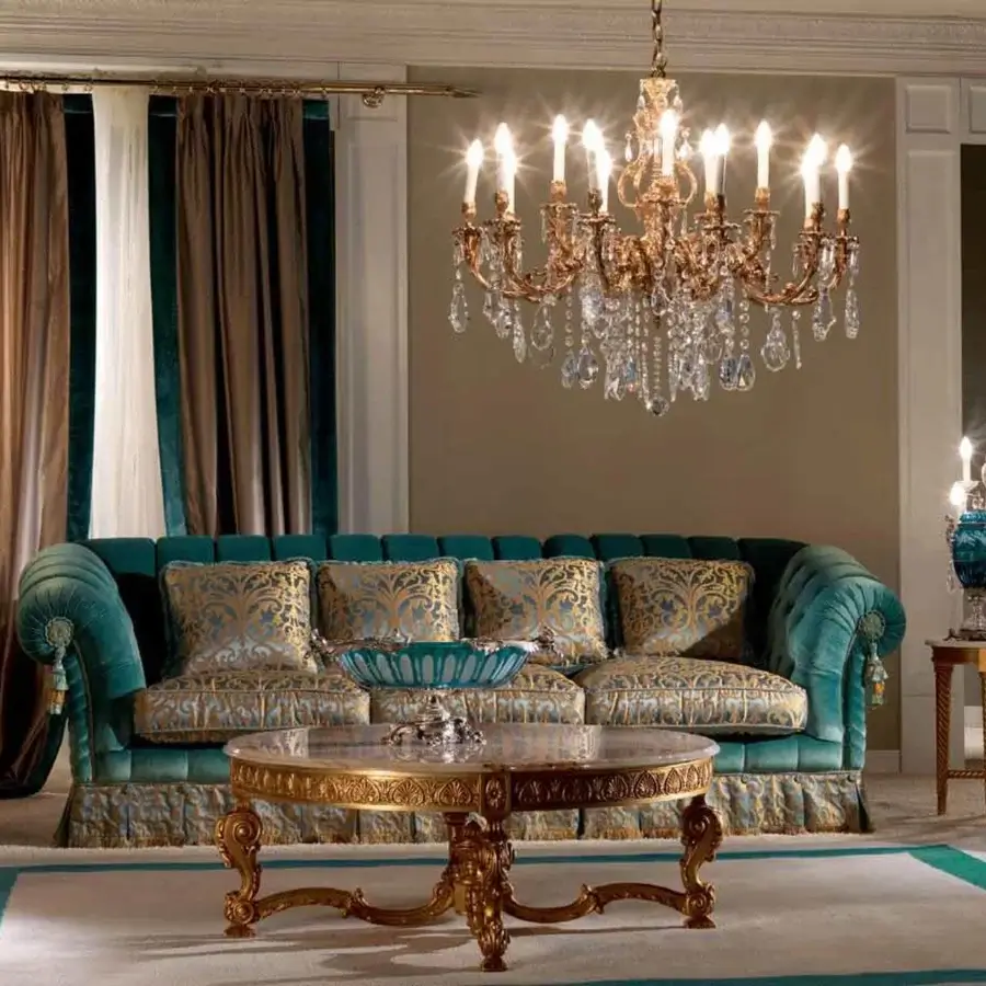 Lavish Zanaboni Ricordi sofa with curved silhouette upholstered in teal textile and ornate gold-toned trim