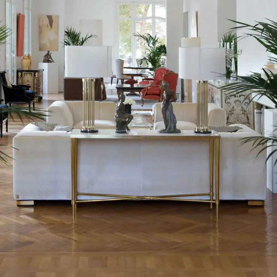 Exclusive Zanaboni T108 console with gold-toned metal frame and light beige central panel in satin sheen
