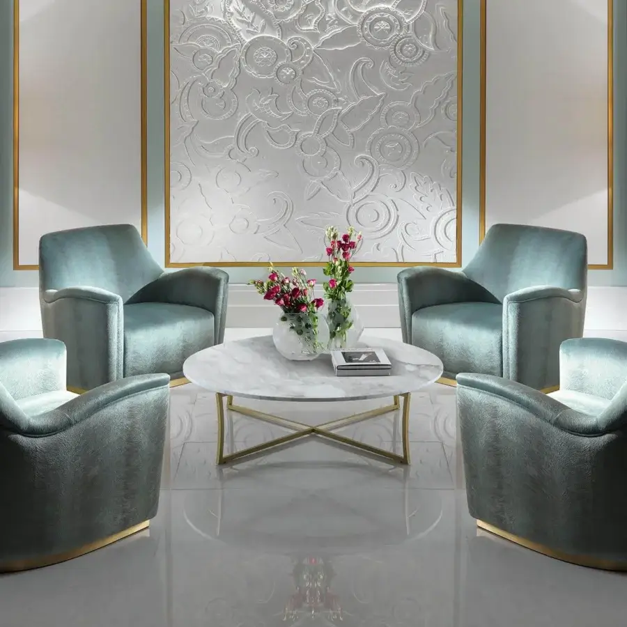 Elegant Zanaboni T108 console with white marble top and refined gold-tone metal base exhibiting a subtle X-frame