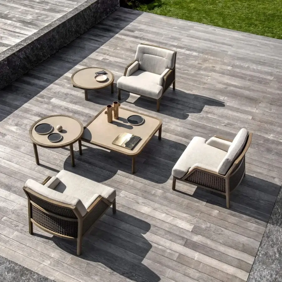 Distinguished Ethimo Grand Life lounge chair with warm brown wood and refined woven textile inspired by Vienna straw cushioning