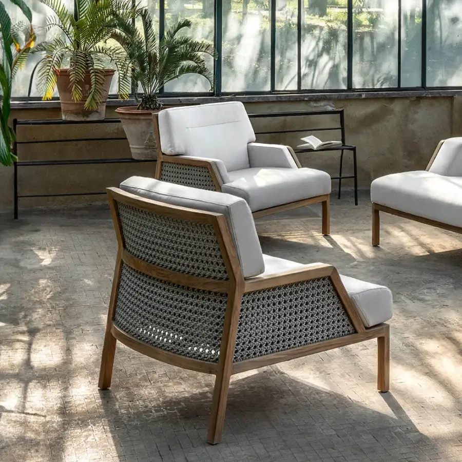 Exceptional Ethimo Grand Life lounge chair with warm wood and refined woven back crafted in Italy with satin finish