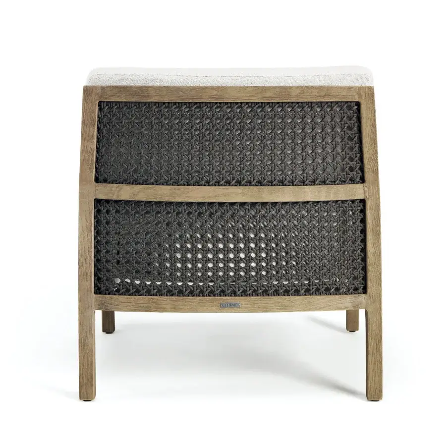 Lavish Ethimo Grand Life lounge chair with warm wood structure and refined dark gray woven panel crafted in Italy