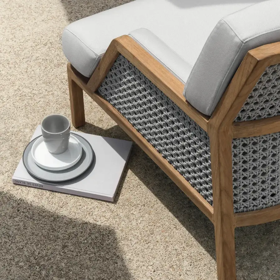 Exceptional Ethimo Grand Life lounge chair with warm wood and off-white woven panels, presenting a light gray padded cushion