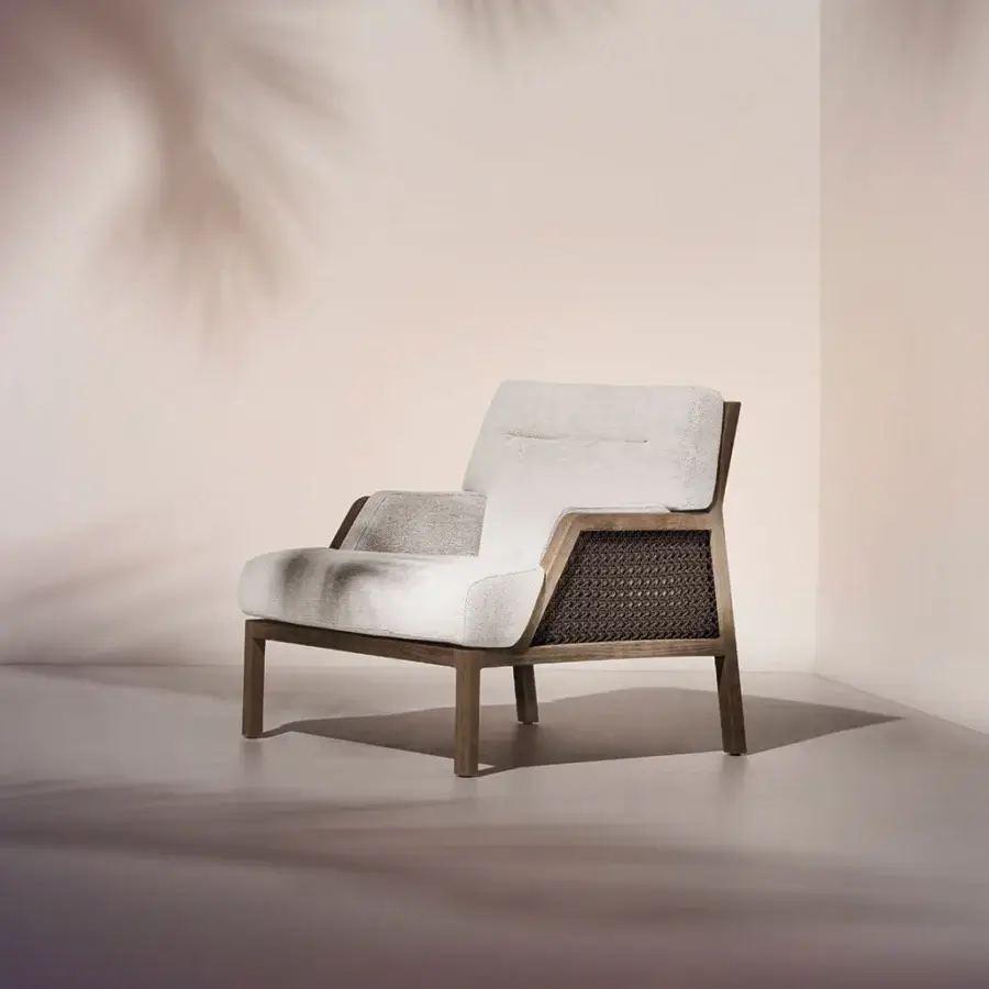 Exceptional Ethimo Grand Life lounge chair crafted with warm wood and a refined off-white weave with satin finish