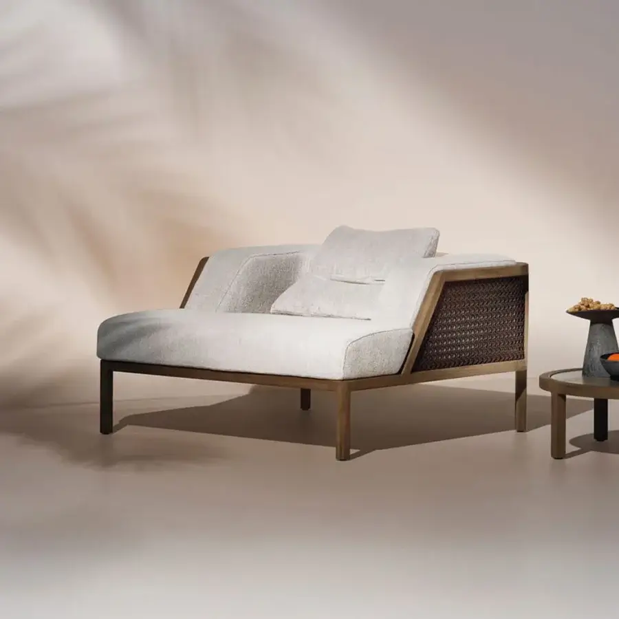 Distinguished Ethimo Grand Life lounge chair with woven texture inspired by Vienna straw and warm wooden frame