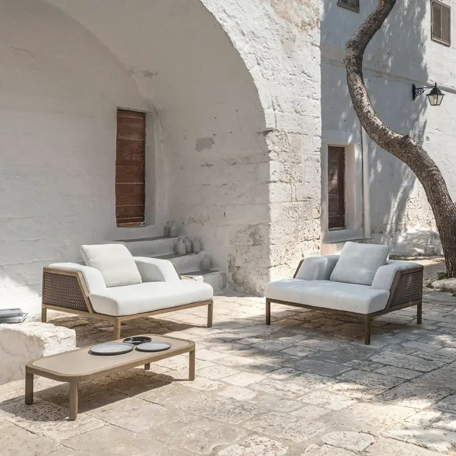 Distinguished Ethimo Grand Life lounge chair crafted with woven textile in off-white and a satin-finish wooden frame