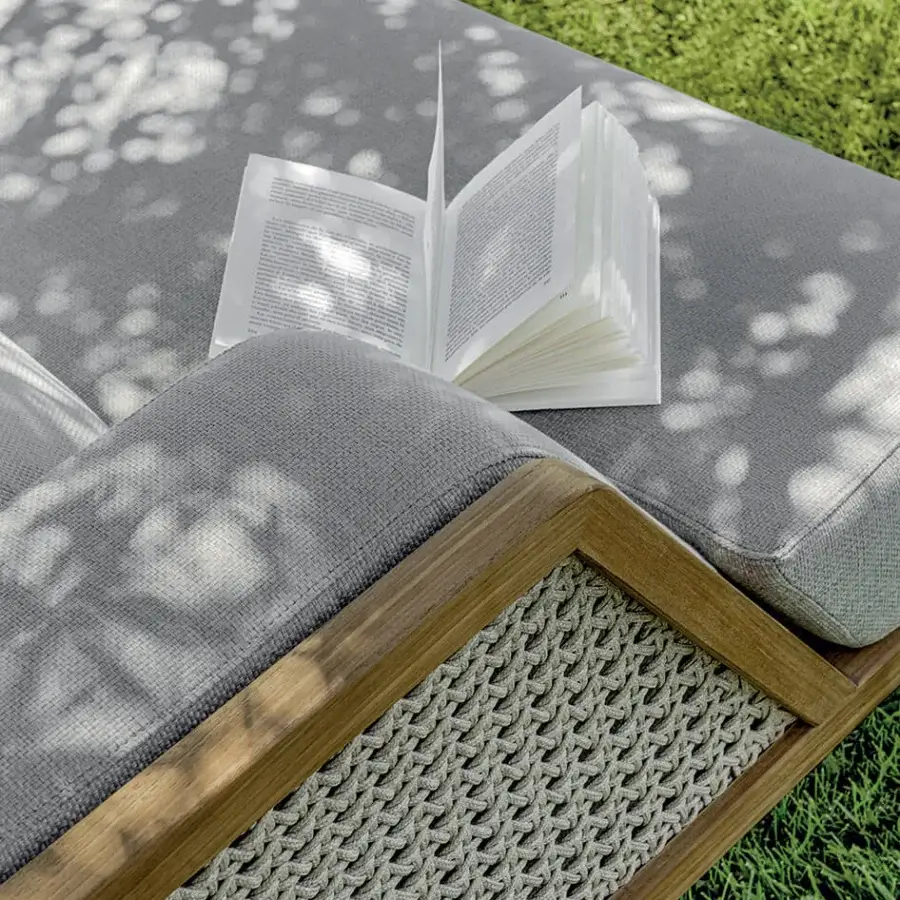Lavish Ethimo Grand Life sofa crafted in Italy with warm wood and meticulously woven medium gray textile