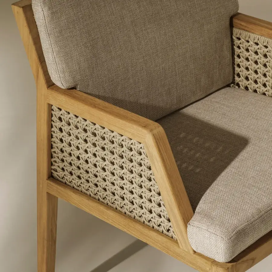 Distinguished Ethimo Grand Life armchair crafted in Italy with woven textile panels and a satin-finish wood frame in a neutral beige tone