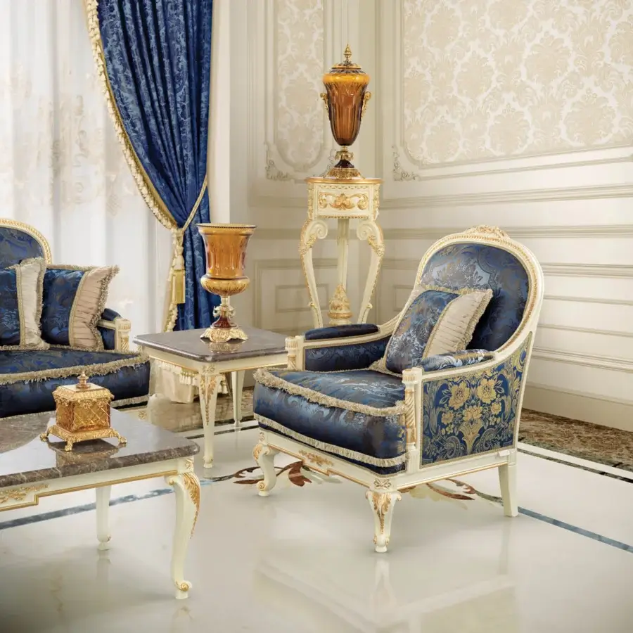 Distinguished Modenese Midnight Moon coffee table with marble top and intricately carved creamy white legs accented with gold finish