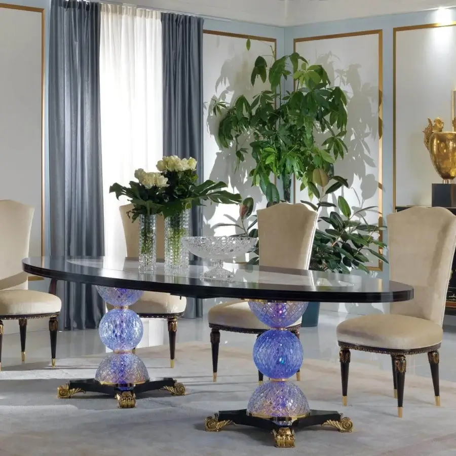 Superior Zanaboni T/4600-270 table with glossy ebony tabletop and sculptural gold-plated brass base plus vibrant blue glass detailing