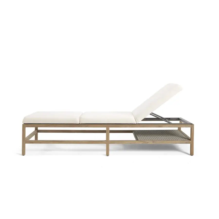 Sophisticated Ethimo Grand Life lounger with light beige woven detail and refined wood frame crafted in Italy