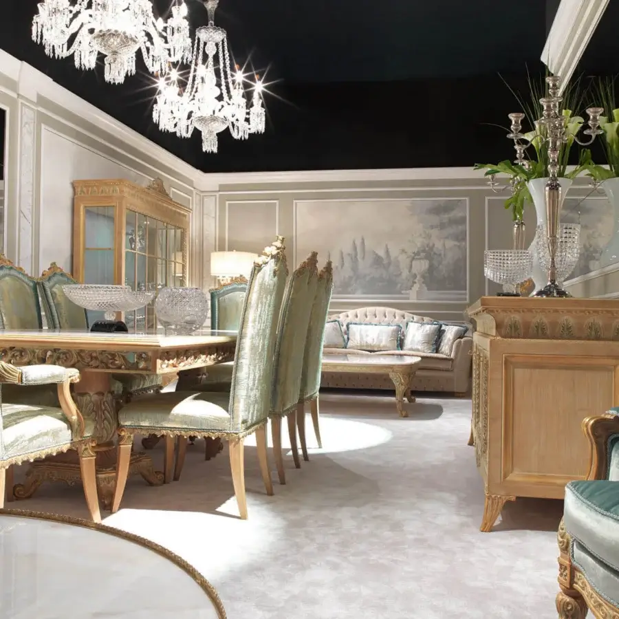 Distinguished Zanaboni T/5000 table built with hand-carved solid wood and spectacular inlaid marble, finished with antique patina and gilded detailing