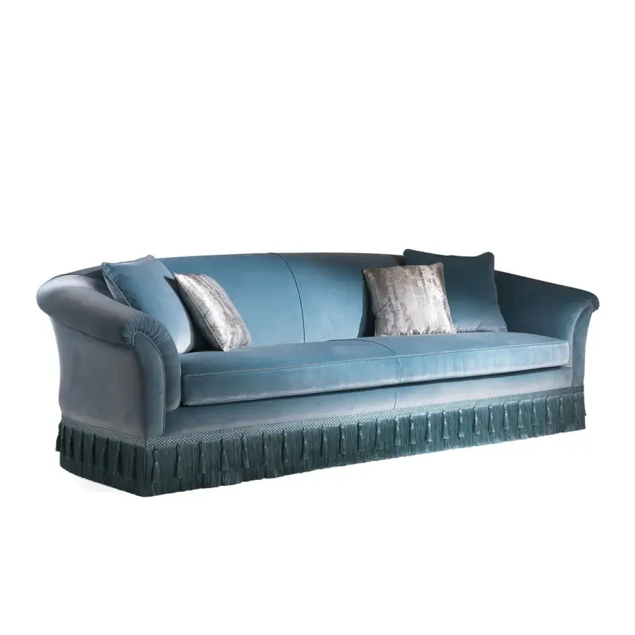 Distinguished Zanaboni Theater sofa crafted in muted teal blue velvet with curled armrests and an embellished fringe trim base