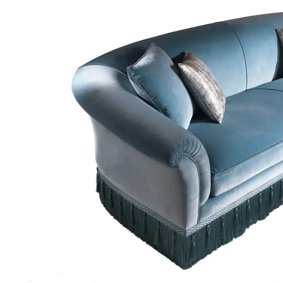 Distinguished Zanaboni Theater sofa upholstered in sophisticated teal fabric with satin finish and elaborate fringe detailing