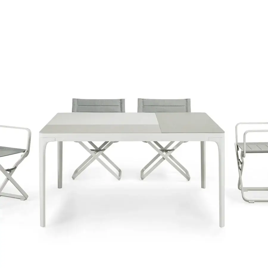 Sophisticated Ethimo Play table crafted in light gray with a matte synthetic surface and X-shaped base