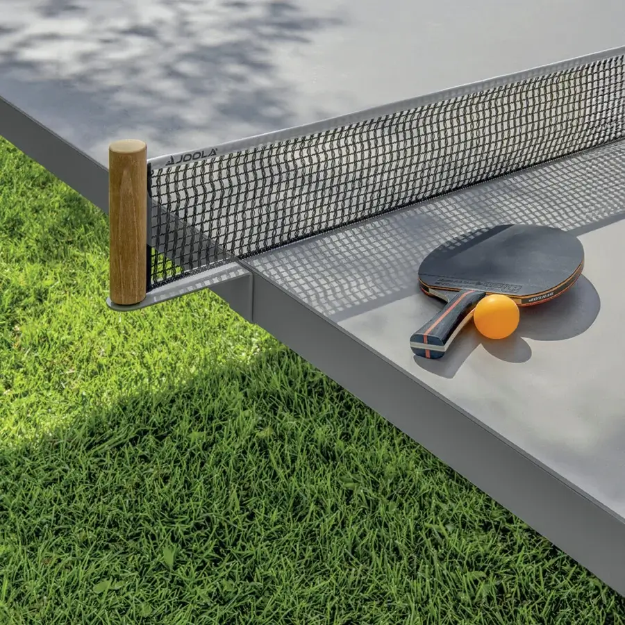 Harmonious Ethimo Play table tennis table with smooth matte grey synthetic tabletop and light-colored hardwood net support