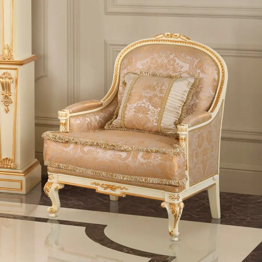 Superior Modenese Midnight Moon lounge chair with white wooden frame and opulent gold leaf detailing plus golden patterned upholstery