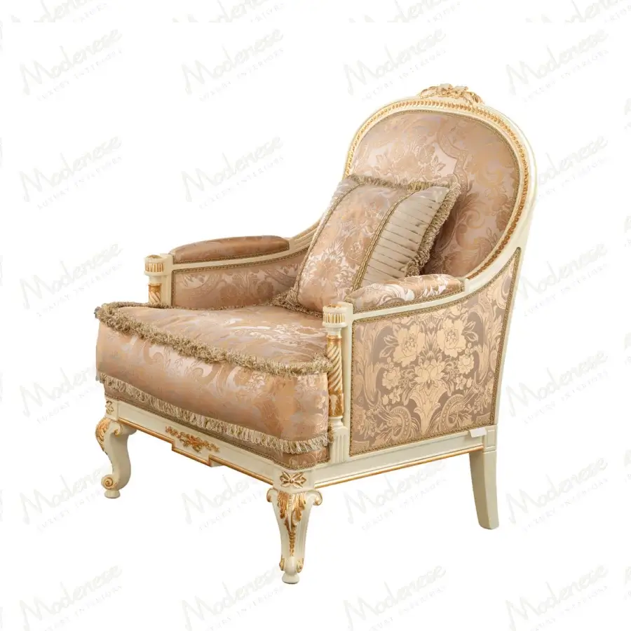 Lavish Modenese Midnight Moon lounge chair with white wooden frame, gold leaf, and beige floral upholstery with fringe