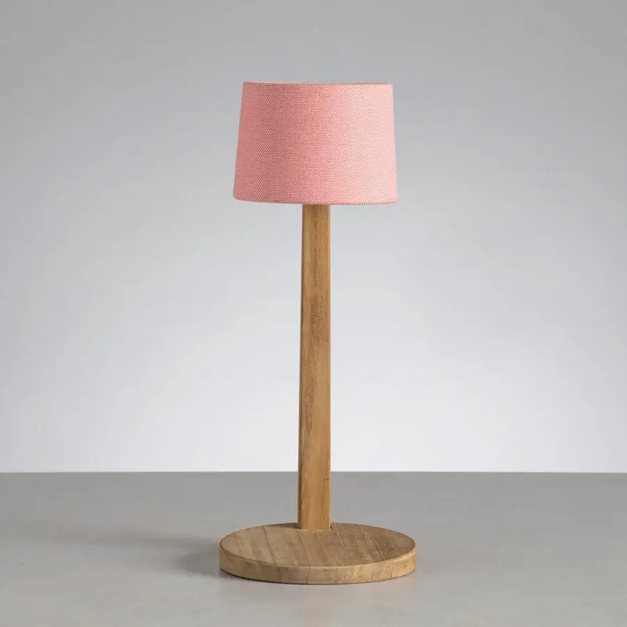 Exceptional Ethimo Gaia table lamp crafted in wood with satin finish and textured pink textile lampshade