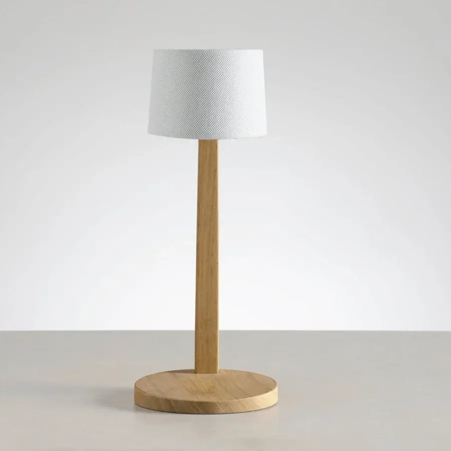 Exceptional Ethimo Gaia table lamp with wood construction and textured textile shade exhibiting a matte finish