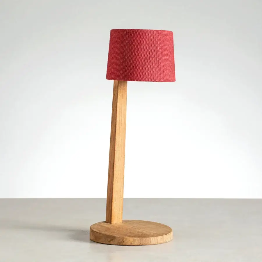 Sophisticated Ethimo Gaia table lamp with wood construction and reddish-pink textile lampshade exhibiting a satin finish