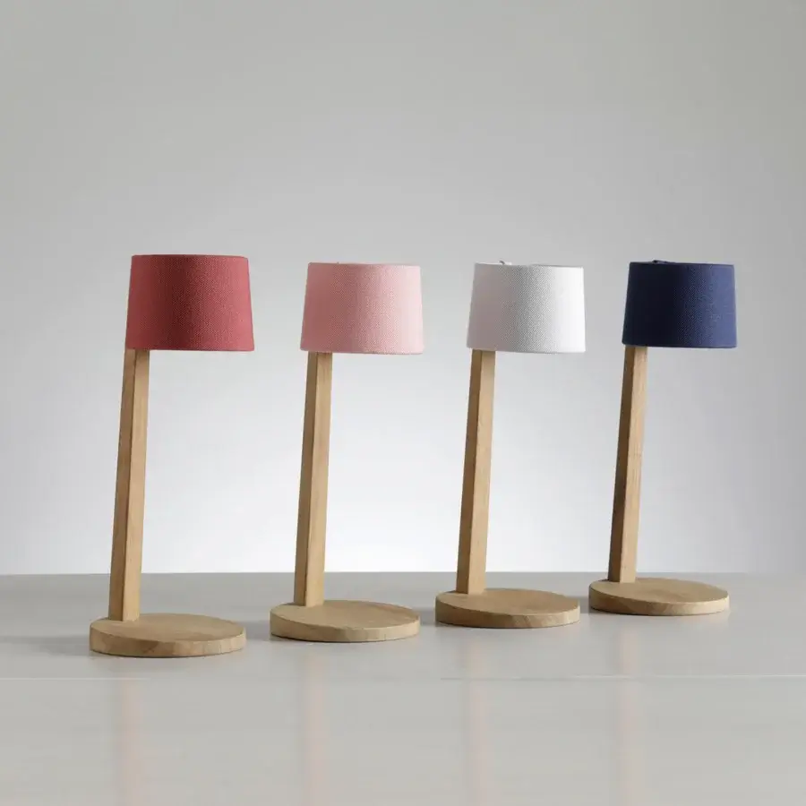 Distinguished Ethimo Gaia table lamp with a cylindrical red textile lampshade and satin-finish wood base crafted with a magnetic system