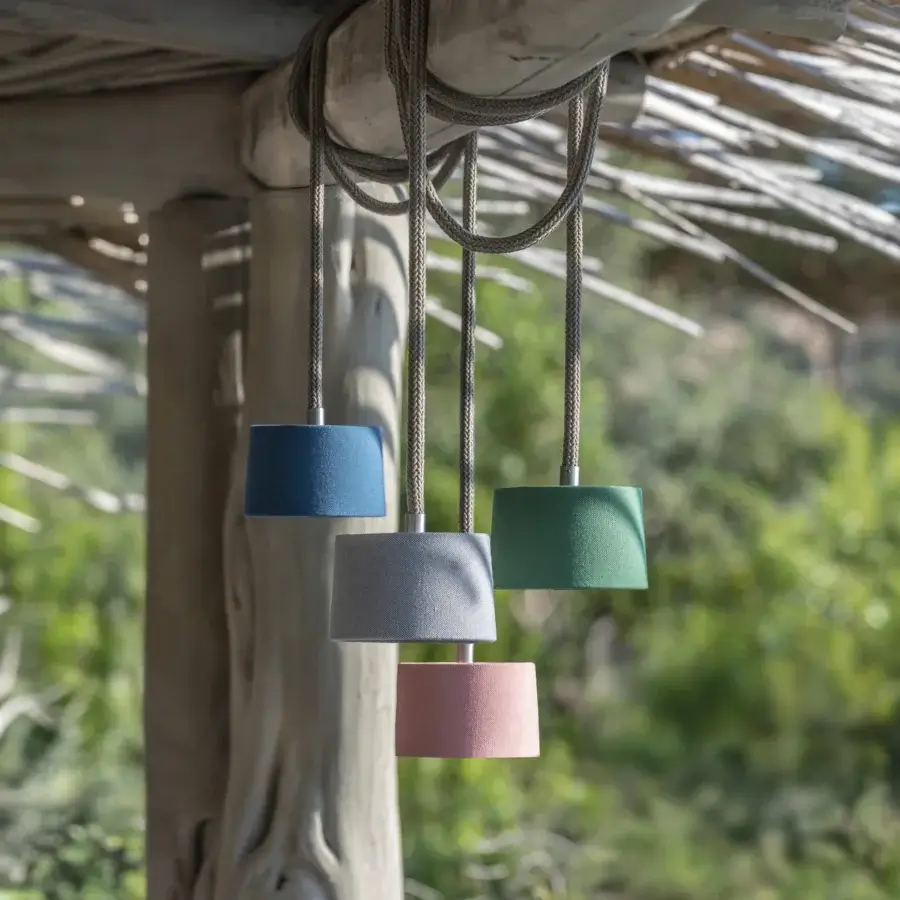 Elegant Ethimo Gaia suspension lamp with a cylindrical textile shade and natural unwired rope crafted in Italy with a matte blue finish