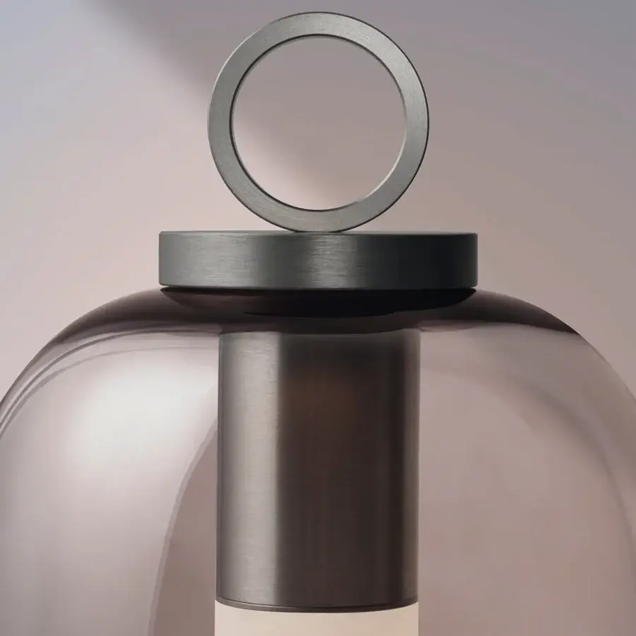 Distinctive Ethimo Lucerna lamp built in dusky rose translucent glass with brushed metal accents and integrated illumination