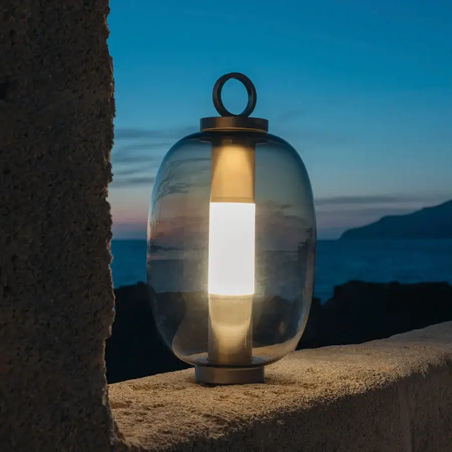 Exclusive Ethimo Lucerna lamp crafted in muted amber glass and metal with a satin finish