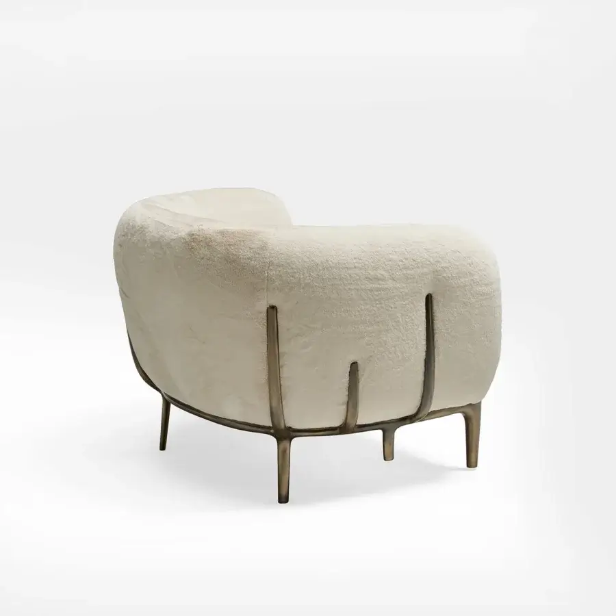 Distinguished Zanaboni Blanca lounge chair with black-stained ash wood and textured off-white textile upholstery with bronze finish